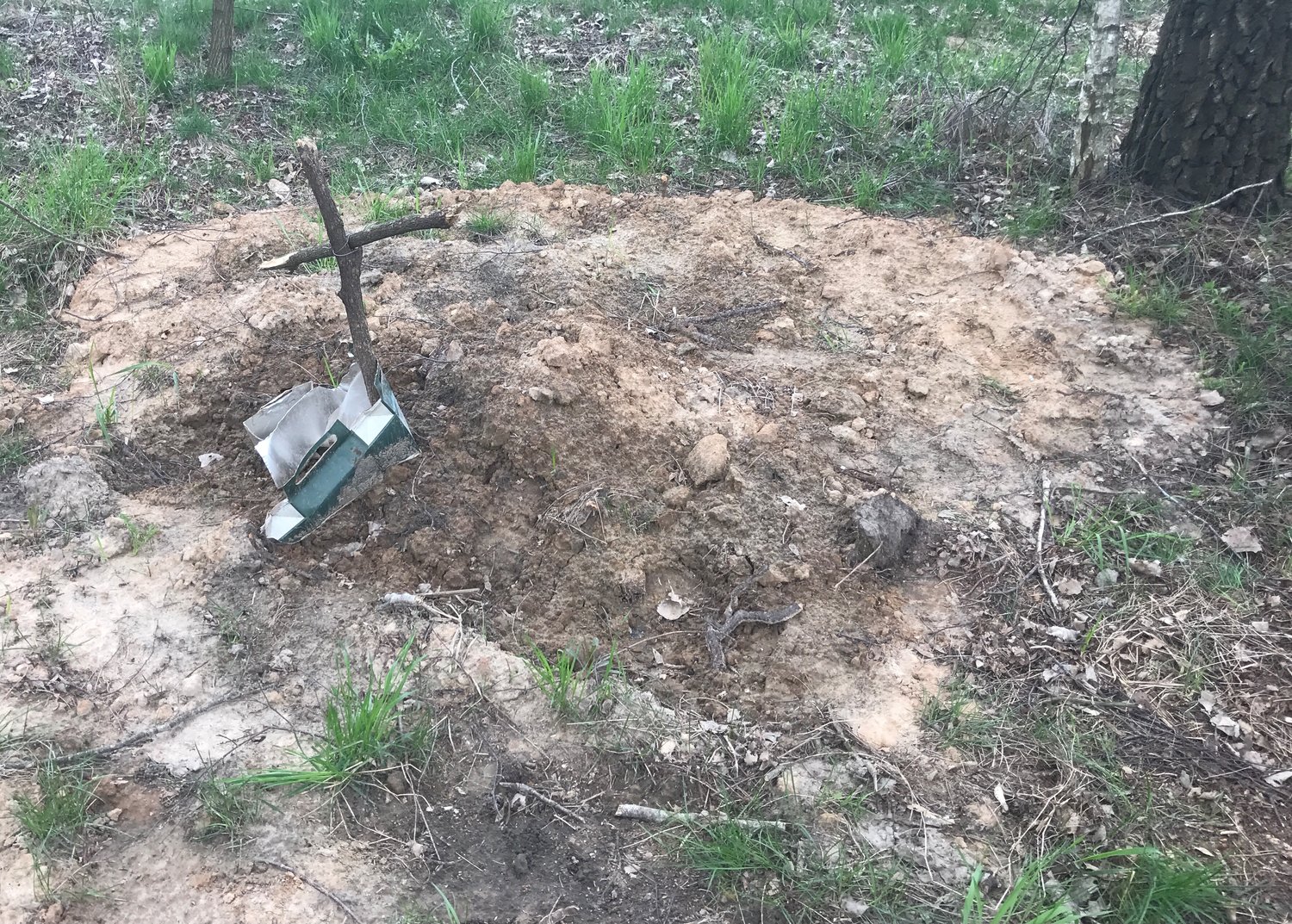 Russian soldier’s makeshift grave near Chernihiv, about 50 feet away from the tank turret